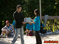 Paul Nguyen receives certificate of appreciation from First Step Camp